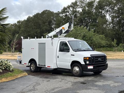 2017 Ford Econoline van with a raised ladder and utility body designed for service work