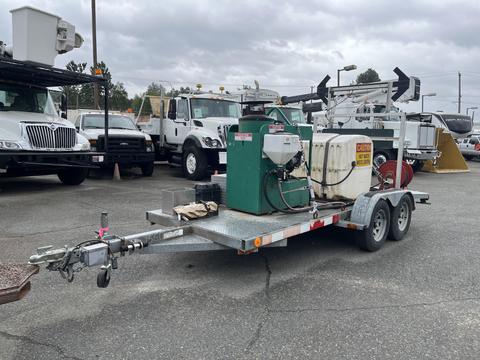 2011 Hightliner Aquacide Hot Water Weed Control Dual Flat Deck Trailer featuring a large tank and equipment mounted on a metal frame with a hitch at the front