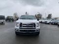 2017 Ford F-150 in white with a prominent front grille and headlights facing the viewer