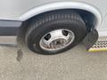 Close-up of a tire on a 2018 Chevrolet Express showing the wheel rim and tread pattern