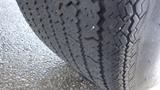 The close-up of a tire from a 1971 Chevrolet Corvette Stingray showcasing the tread pattern and surface details of the rubber