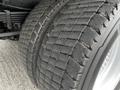 Close-up of the tire tread on a 2006 Hino 268 showing visible wear patterns and grooves