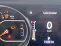 Dashboard display of a 2020 Jeep Wrangler showing RPM gauge speedometer and warning lights