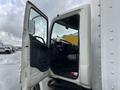 A 2008 Hino 268 truck with an open driver's side door revealing the interior cabin and steering wheel
