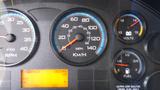 Dashboard of a 2012 International TerraStar displaying speedometer tachometer fuel and voltage gauges along with an odometer reading