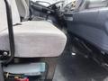 Interior view of a 2008 Hino 268 showing the driver's seat and dashboard with controls and steering wheel visible