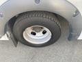 A close-up of a tire on a 2018 Chevrolet Express showcasing the wheel and tread pattern