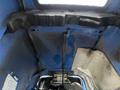 The interior view of a 2007 New Holland TN70A tractor showing the engine compartment and support struts