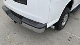 2017 Chevrolet Express Quigley 4x4 with a focus on the rear bumper and exhaust pipe