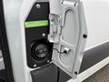 Close-up of a 2019 Mercedes-Benz Sprinter fuel door open showing the diesel fuel cap and informational label