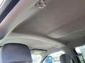 The interior ceiling of a 2019 Ford F-350 SD showing a smooth surface with a fabric-like texture and a handle mounted on the overhead