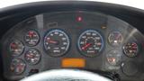 Dashboard of a 2015 International PC105 showing various gauges including speedometer tachometer fuel and oil pressure indicators