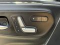 A control panel for seating adjustments in a 2019 Mercedes-Benz Sprinter featuring buttons for heated seats and memory settings