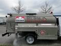 A 2018 Ford F-550 fuel truck with a silver tank featuring the Petro Canada logo and text stating On-Site Refuelling Flammable