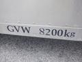 A silver panel displaying the text GVW 8200kg on the side of a Morgan Olson Workhorse W42 vehicle