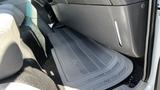 A 2006 Ford LCF 550 interior floor mat with a textured design laid across the floor beneath the front seat area