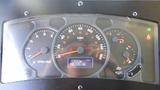 The dashboard of a 2005 Morgan Olson Workhorse featuring speedometer tachometer fuel gauge and digital display for mileage and fuel level