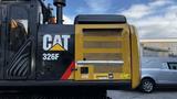 A 2018 Cat 326F Track excavator with a prominent yellow and black design featuring the Cat logo and model number on the side