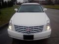 A white 2008 Cadillac Limousine with a prominent front grille and logo displayed in the center