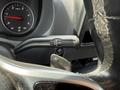 Close-up of the gear shift lever of a 2019 Mercedes-Benz Sprinter showing drive modes R N D with a start engine button below