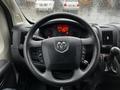 Steering wheel of a 2018 RAM Promaster featuring the RAM logo and various control buttons