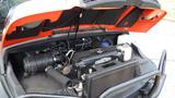 The image shows the engine compartment of a 2018 Kubota RTV X1100C with its hood lifted revealing various components and machinery inside