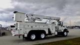 A white 2008 International 7500 bucket truck with a raised aerial lift and a storage compartment in the back