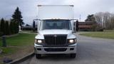 A 2012 International TerraStar truck with a white box cargo area and a black front grille facing the viewer