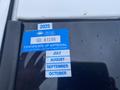 A blue certificate of approval sticker adhered to a vehicle window featuring the text British Columbia GD 97295 Certificate of Approval and months July August September October