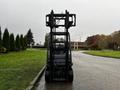 A 2017 Toyota 8FCGCU25 forklift with a black frame and lifting forks positioned at the front