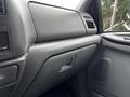 Interior dashboard of a 2008 Ford F-750 showing the glove compartment and control panel