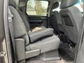 Interior view of a 2013 Chevrolet Silverado Hybrid with a focus on the backseat and seat configuration