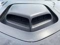 Close-up of the hood scoop on a 2017 Dodge Challenger showcasing the sleek design and air intake vents