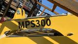 A yellow MachPro MP-S300 equipment with a labeled bar displaying the text MPS300 on its side