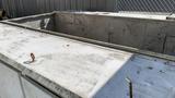 A 2000 Service Deck 9 Foot with a flat metallic surface and several visible rusted screws and handles