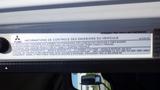 Label detailing emissions control information for a 2015 Mitsubishi Fuso FE vehicle