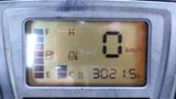 Dashboard display of a 2018 Kubota RTV X1100c showing fuel level hour meter and speedometer with readings of 0 km/h and 3021.5 hours