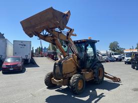 A 2008 Case Super 580M backhoe loader with an extended front bucket and rear excavator arm positioned upward