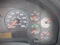 The dashboard of a 2006 International 4300 displaying gauges for speed fuel pressure air volts and mileage