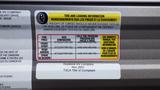 Tire and loading information label for a 2022 Aspen Trail RV detailing weight limits and tire specifications