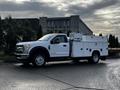 2017 Ford F-550 service truck with a white utility body and tool compartments on the side