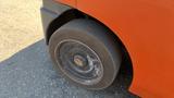 Close-up of a tire on a 2018 Toyota 8FGCU25 forklift showing worn tread and a steel rim