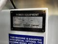 A metal identification plate for a 2007 Tennant Sentinel detailing the serial number and company information