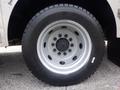 Close-up of a silver wheel with a black tire labeled Sailun mounted on a 2007 Morgan Olson Workhorse W42