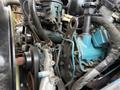 A 2007 International 4200 engine, featuring visible hoses, wires, and various mechanical components in a detailed close-up view