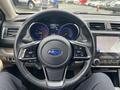 Interior view of a 2019 Subaru Outback showing the steering wheel dashboard and infotainment screen with navigation display