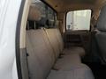 Interior view of a 2008 Dodge Ram 5500 crew cab with gray cloth seats and a simple backseat layout