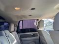 Interior view of a 2013 Ford Expedition showing leather seats and overhead lighting