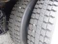 Close-up of a tire on a 2015 International 4400 showing detailed tread patterns and a portion of the axle