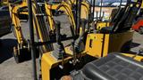 A 2021 Cael-1T Mini excavator featuring dual joystick controls and a compact design for maneuverability in tight spaces